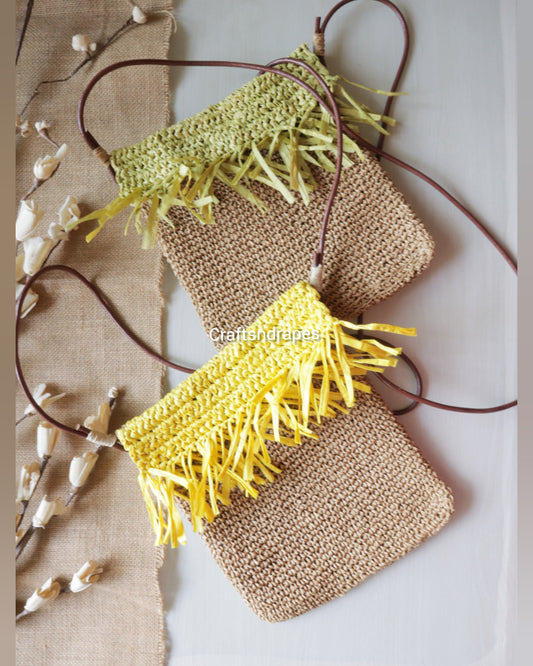 Raffia bag displaying natural texture and rustic charm.